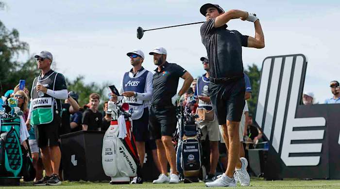Joaquin Niemann plays his shot from the 8th tee during the final round of the 2023 LIV Golf Miami golf tournament at Trump National Doral.